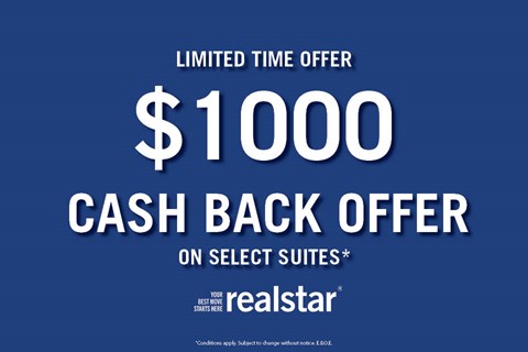 A blue advertisement for a $1000 cash back offer on select suites from realstar.