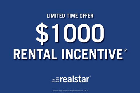A blue advertisement for a $1000 rental incentive from Realstar.