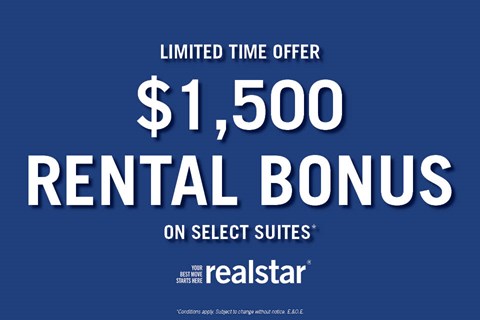 A blue advertisement for a $1,500 rental bonus on select suites at Realstar.