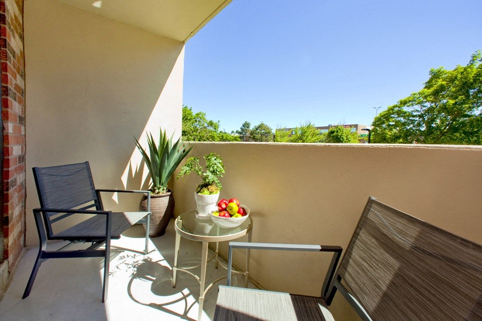 Balcony with outdoor furniture at Highpoint Apartments in Barrie