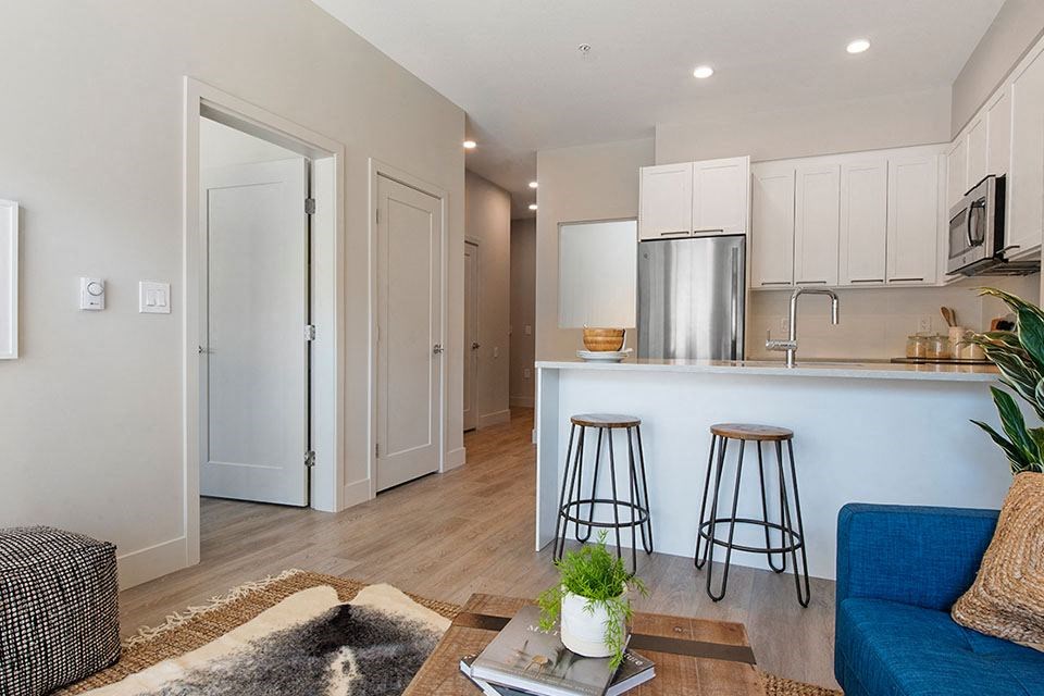 Inlet Glen Apartments in Port Moody, BC open concept living room and kitchen