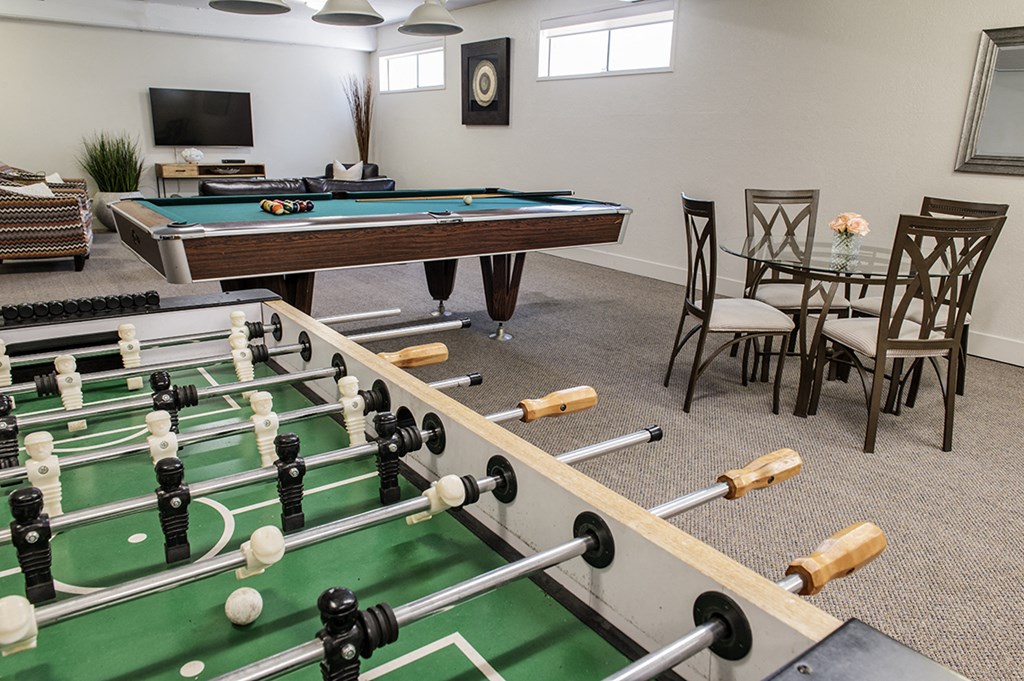 Glades on 55 games room featuring pool table and foosball table in Langley, BC