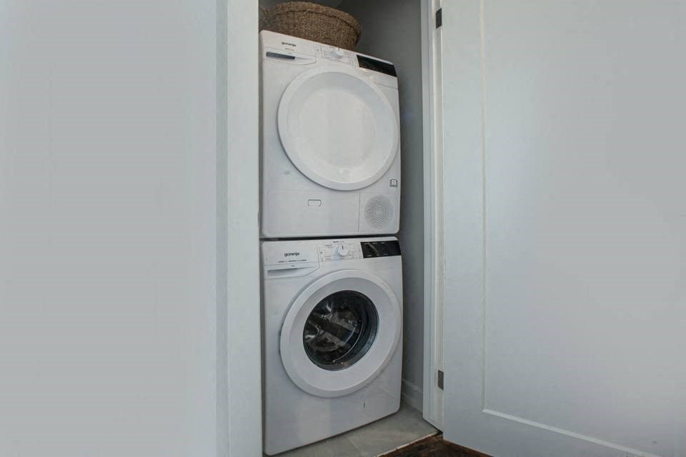 La Salle Towers in-suite laundry featuring stackable washer and dryer in Burlington, ON