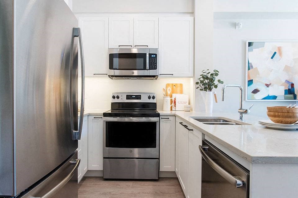 Inlet Glen Apartments in Port Moody, BC kitchen includes stainless appliances