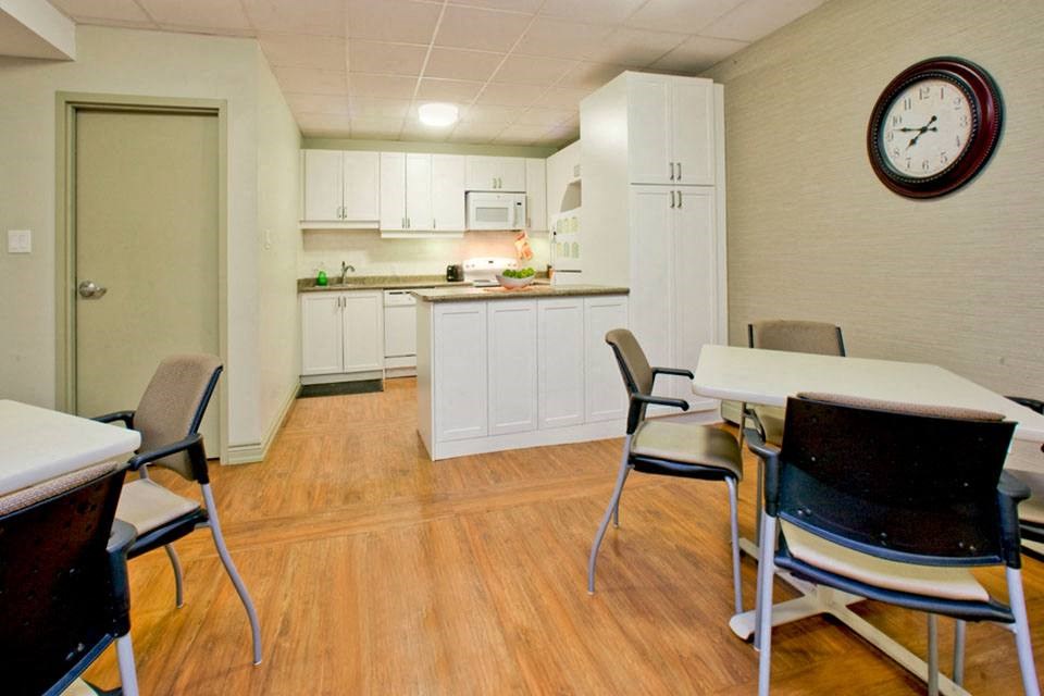 Prince Court Princess Manor in Welland, ON social room with kitchen area