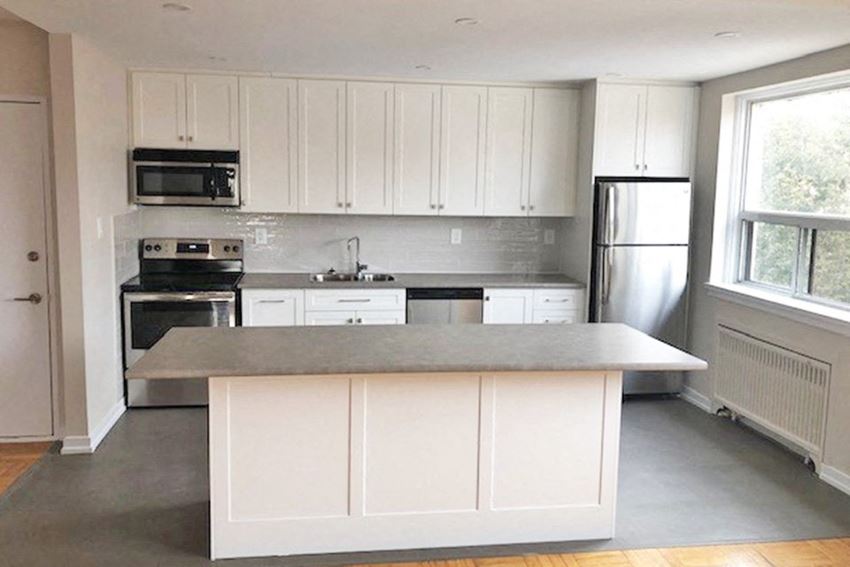Berry Road in Etobicoke, ON kitchen with staineless steel appliances