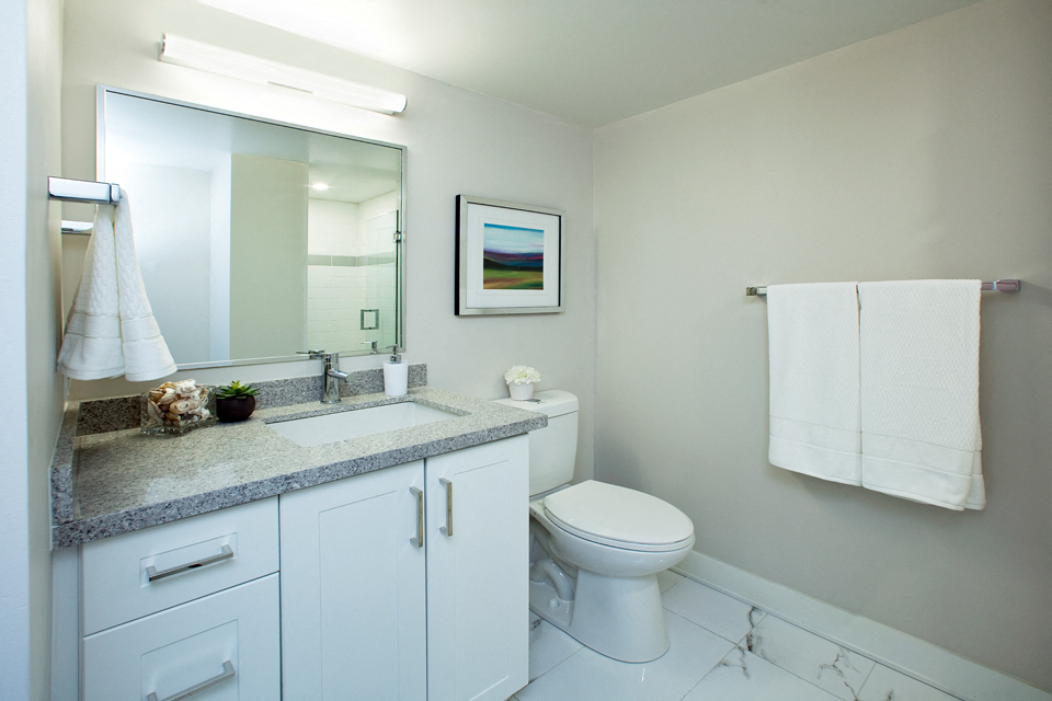 Brookbanks Elegant, modern style full bathroom with small counter space in Toronto, ON