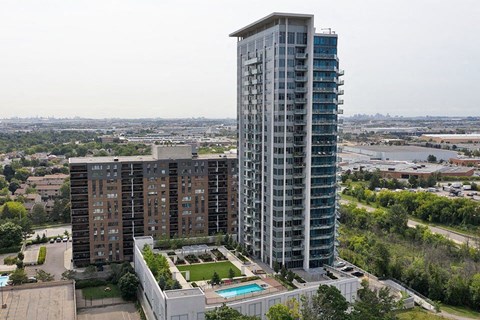 Exterior of building with outdoor pool and courtyard at 188 Cityview in Brampton, ON