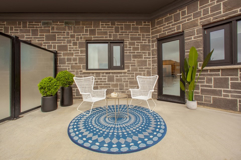 Ground floor south-facing patio at Bayfield Tower Apartments in Barrie, ON