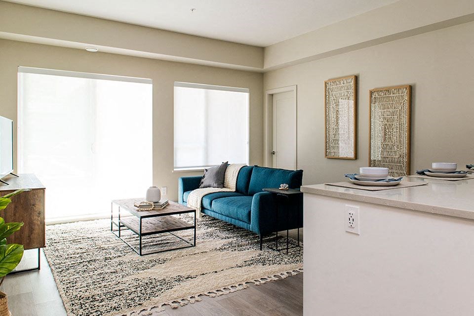 Inlet Glen Apartments in Port Moody, BC living room with access to private balcony or patio