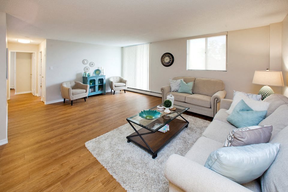a living room with a couch and a table