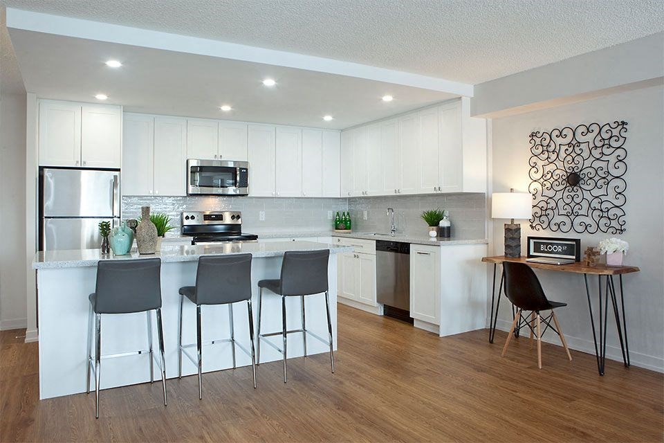 Royal Rose in Etobicoke, ON large kitchen island and overhead lighting