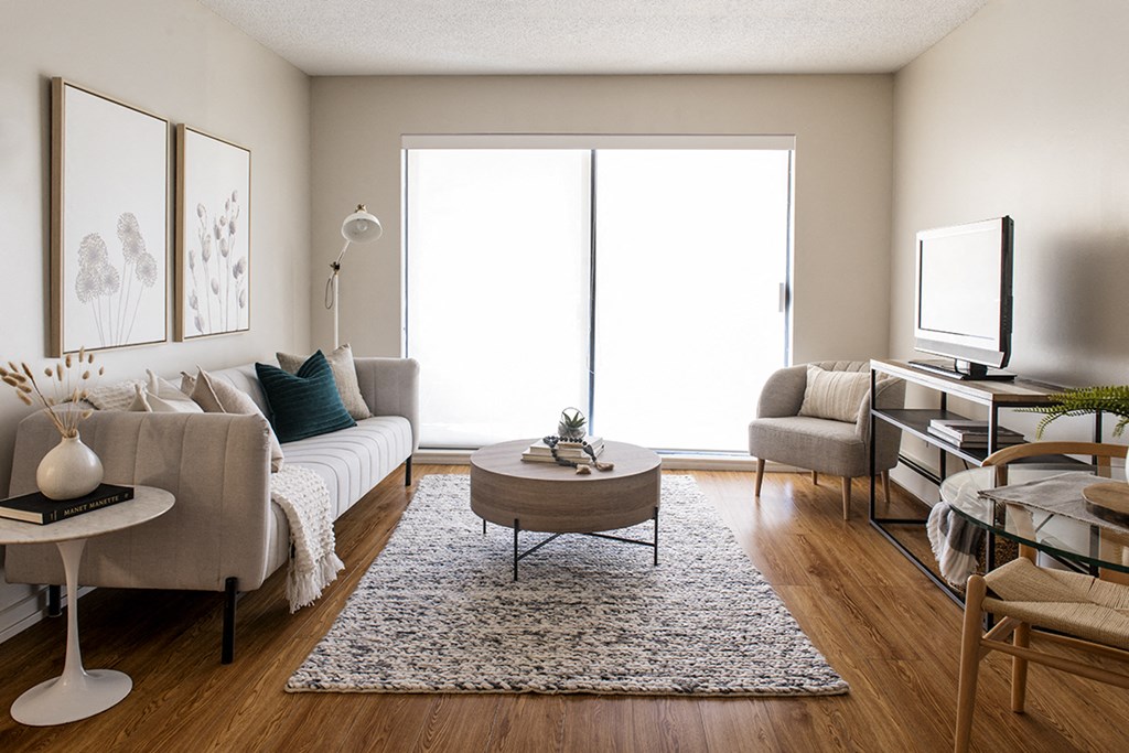 Glades on 55 living area featuring large brightly lit window in Langley, BC