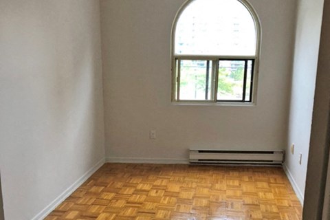 5062-5078 Dundas Street bedroom with hard surface flooring