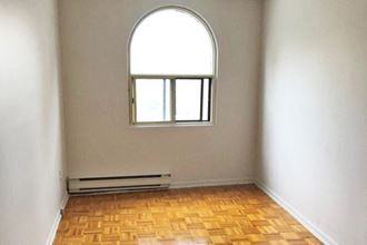 5062-5078 Dundas Street brightly lit bedroom - Photo Gallery