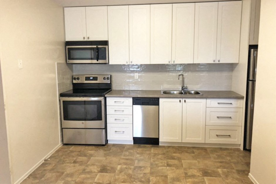 5062-5078 Dundas Street in Etobicoke, ON kitchen with stainless steel appliances