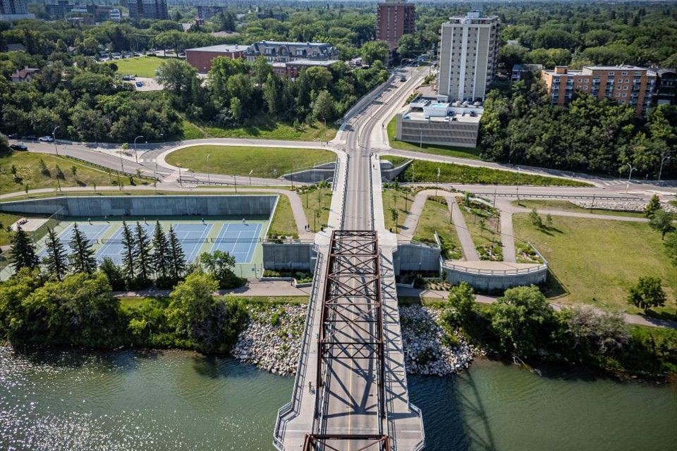 an aerial view of a bridge over a river