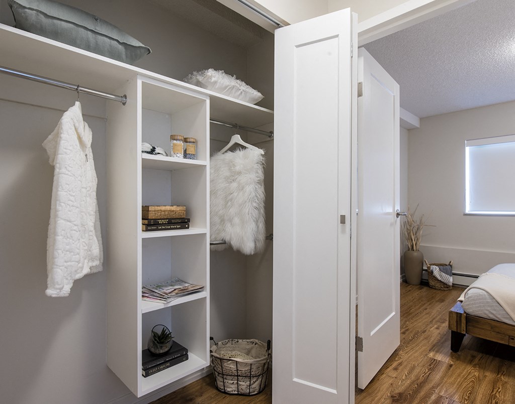 Glades on 55 walk-in closet featuring built in organizers in Langley, BC