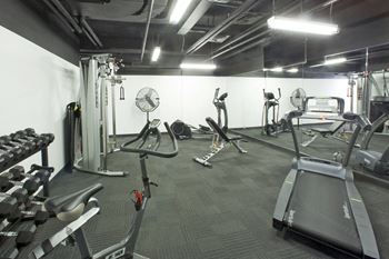 fitness facility with equipment at BeachHill Apartments in Toronto ON