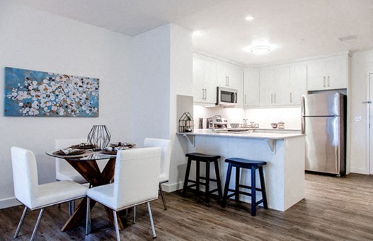 Open concept dining and kitchen at 99 Jasper in Edmonton, ON