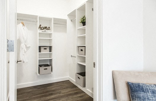 High end bedroom design and generous closet space at 99 Jasper in Edmonton, AB