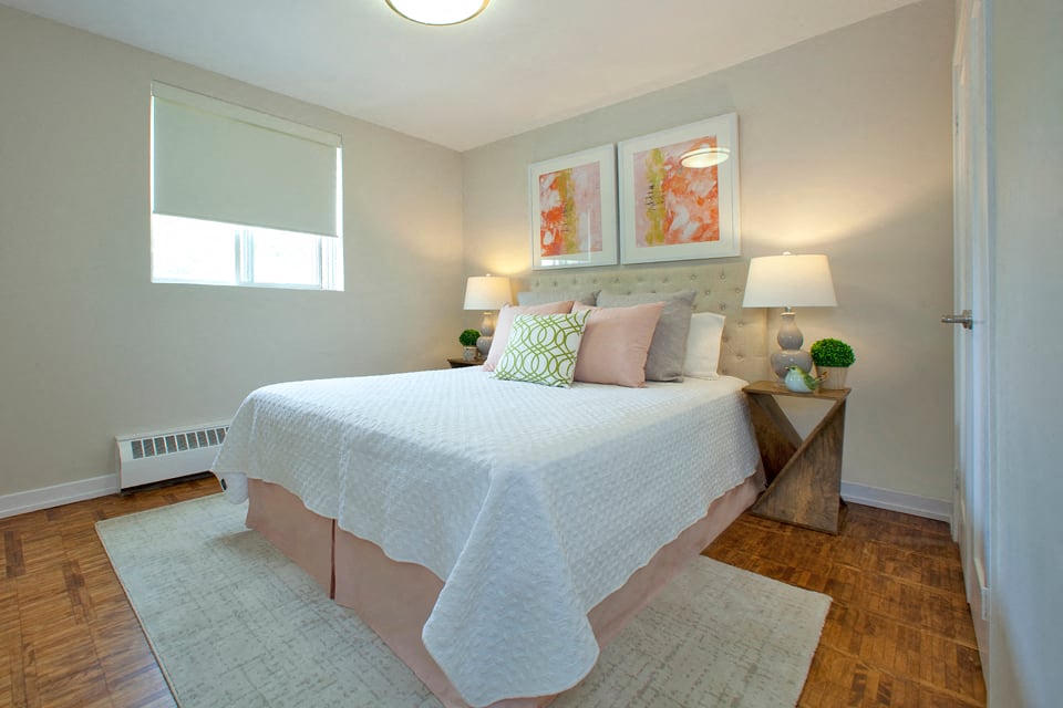 Acton Apartments cozy bedroom with hardwood flooring in Acton, ON