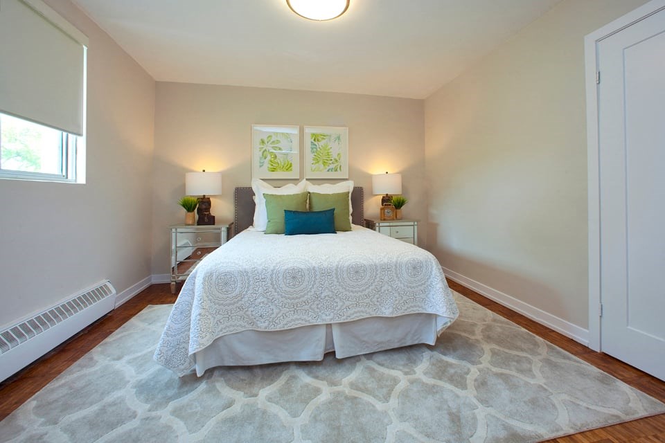 Acton Apartments bedroom with hardwood flooring in Acton, ON