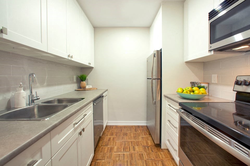 Acton Apartments modern kitchen with stainless steel appliances in Acton, ON