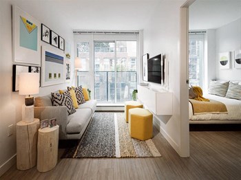 The Duke in Vancouver, BC Livingroom with access to private balcony - Photo Gallery 2