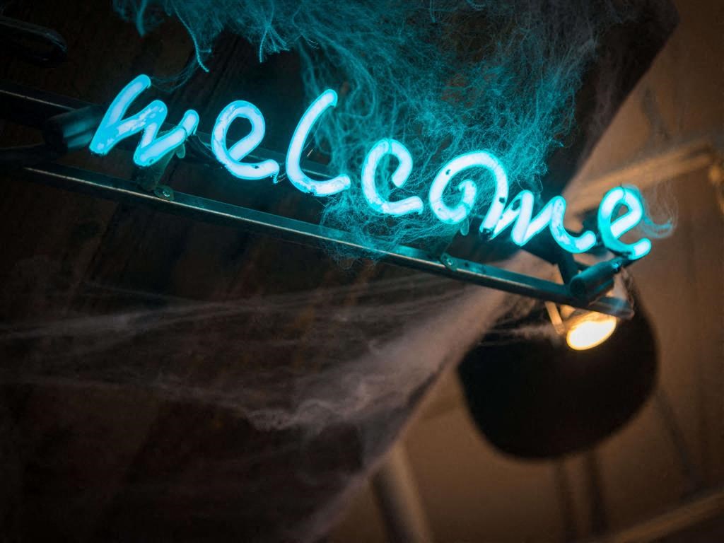 Neon sign that reads welcome