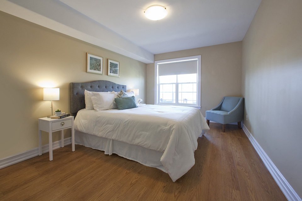 Baker Arms & Wexford Apartments roomy bedroom with hardwood flooring in Dartmouth, NS