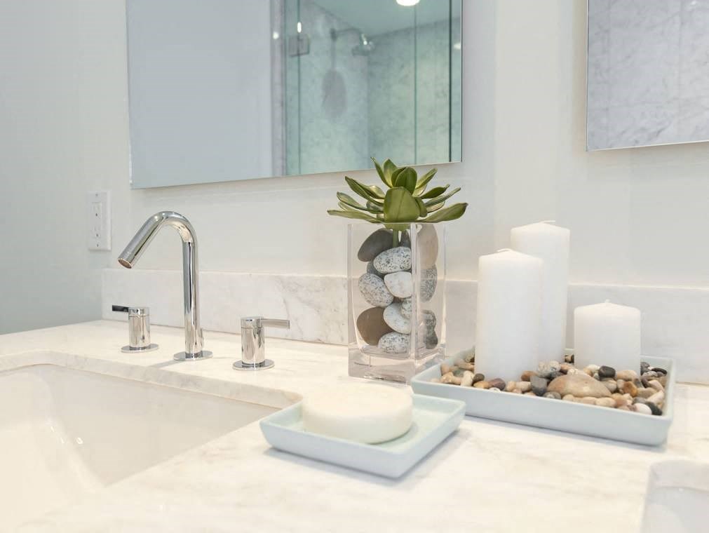 The Cliffs at Dellridge featuring a modern washroom with vanity and mirror in Bedford, NS