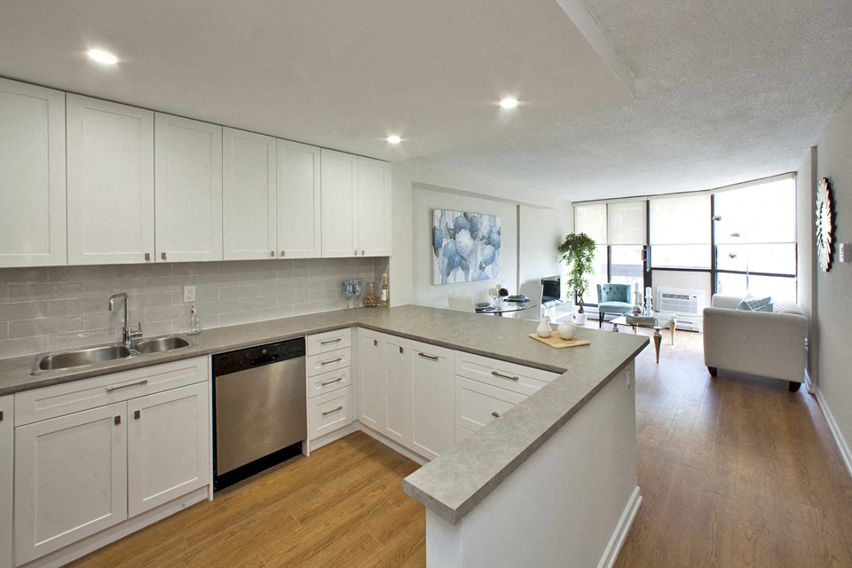 Bay Terrace open concept kitchen with view of living room in Belleville, ON