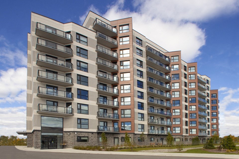 Exterior view of front of building at Bayfield Tower Apartments in Barrie, ON