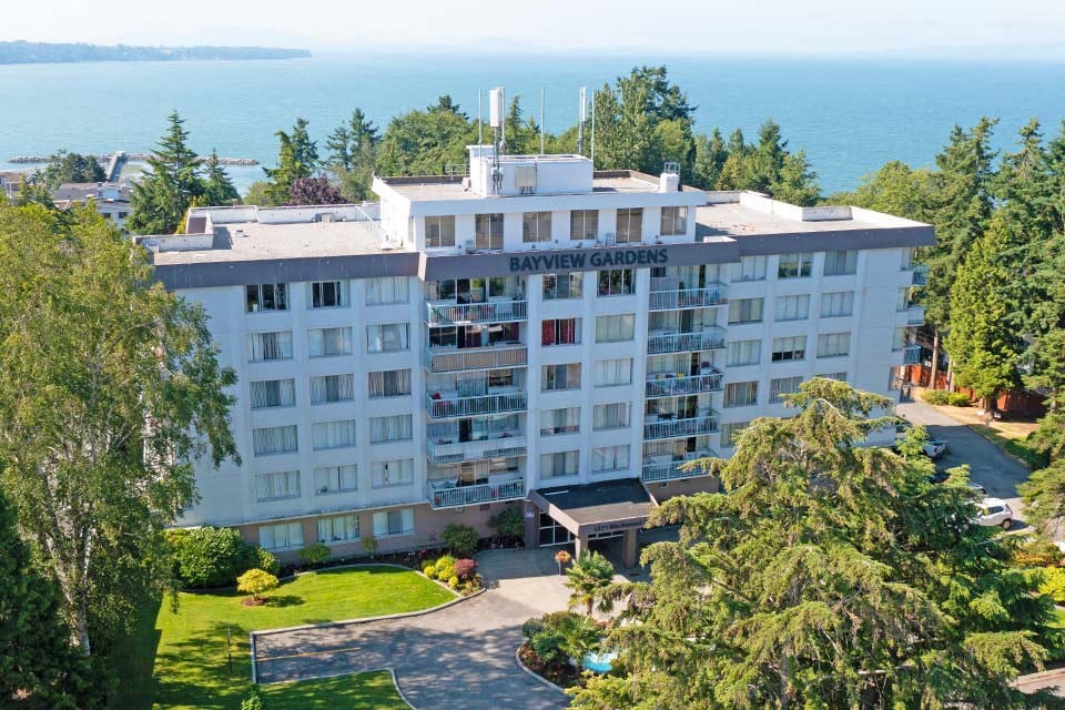 Bayview Gardens Apartments drone image of main building in White Rock, BC