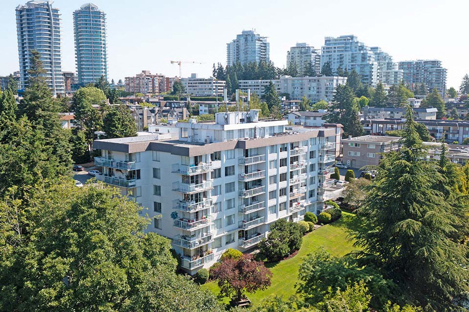 Bayview Gardens Apartments building exterior with cityscape in White Rock, BC