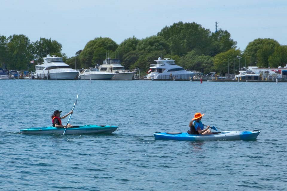 Residents of Sarnia, ON kayaking on Sarnia Bay near Bayview Towers
