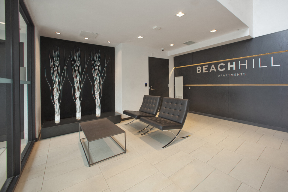 BeachHill Apartments lobby featuring modern seating and table in Toronto, ON