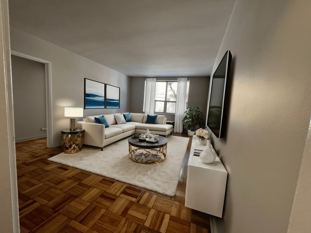 a living room with a table and chairs and a couch at Bexhill Court in Etobicoke Ontario