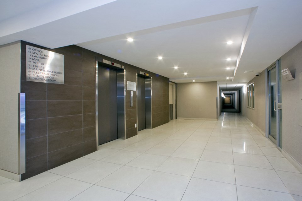 Brighton Court lobby with elevators in Windsor, ON