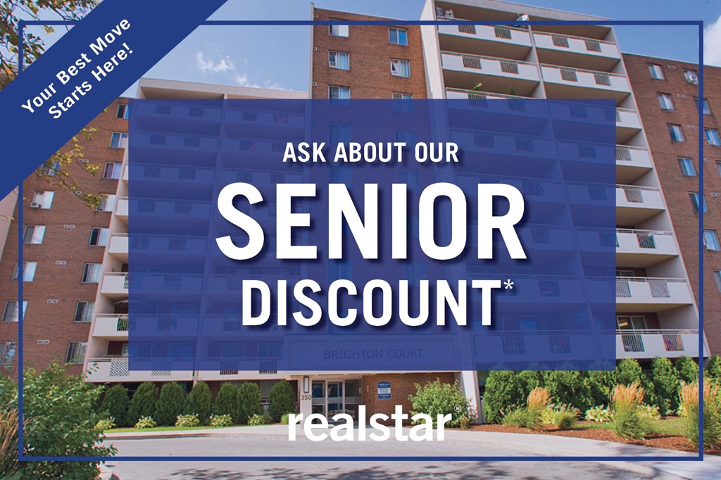 a sign that says ask about our senior discount in front of an apartment building