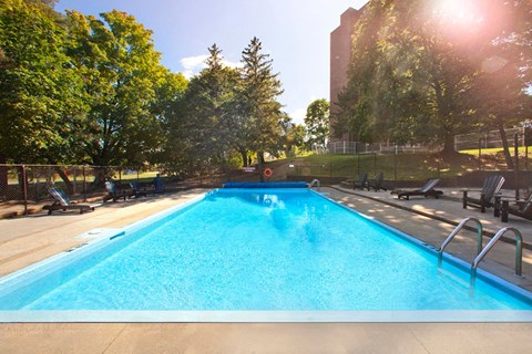 Britannia by the Bay in Ottawa, ON large outdoor pool with seating