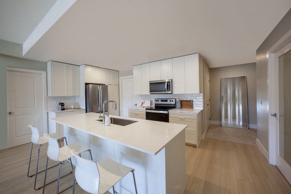 kitchen wit stainless steel appliances at Brookline Apartments in Bedford NS