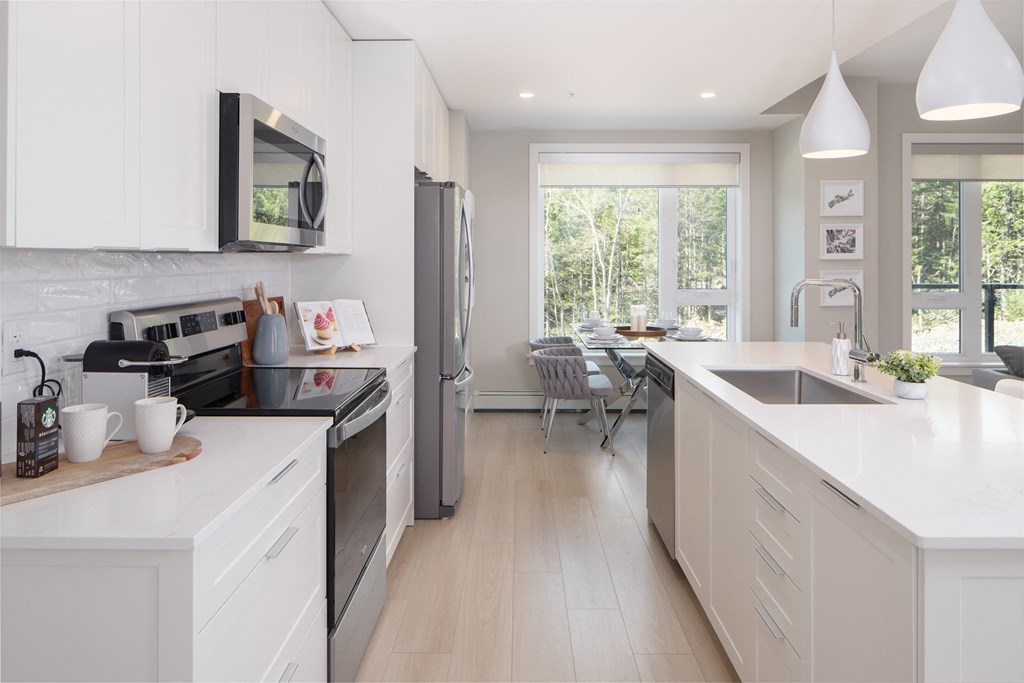 kitchen wit stainless steel appliances at Brookline Apartments in Bedford NS