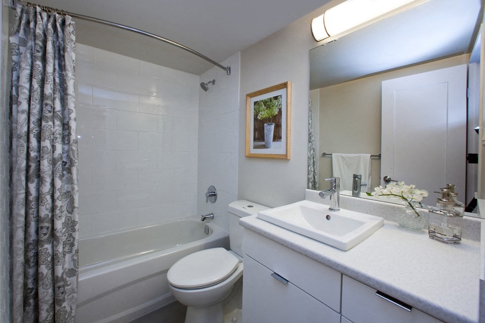 Cambridge Place Apartments bathroom featuring modern finishes and tub shower in Scarborough, ON