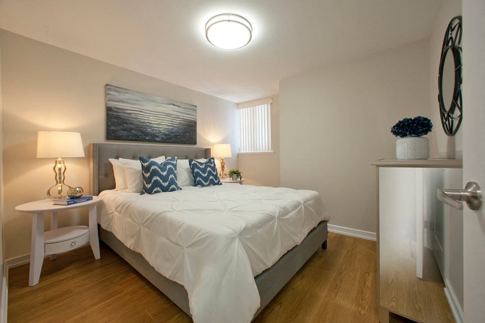 Carriage Hill in Oshawa, ON bedroom with luxury vinyl plank flooring