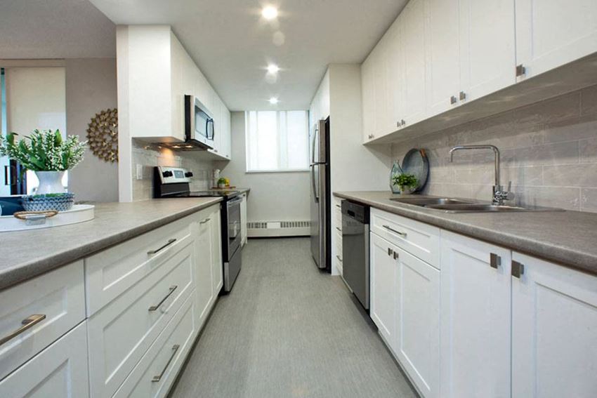 Cedarwoods Tower in Kitchener, ON kitchen with upgraded cabinetry and LED pot lights