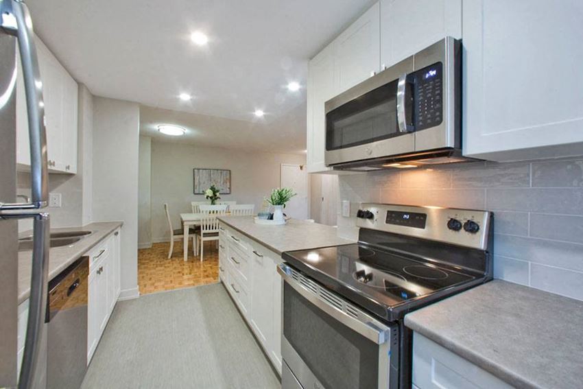 Cedarwoods Tower in Kitchener, ON kitchen includes stainless steel appliances