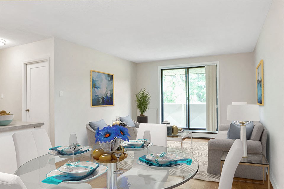 Chestnut Court open concept living and dining room with access to balcony in St. Thomas, ON