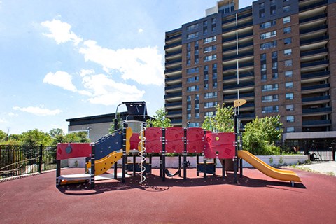 Children's playground with yellow slide